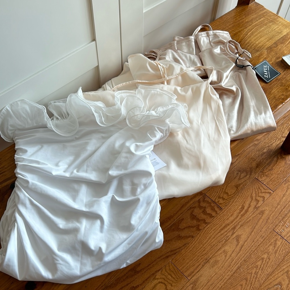 3 brand new never worn dresses